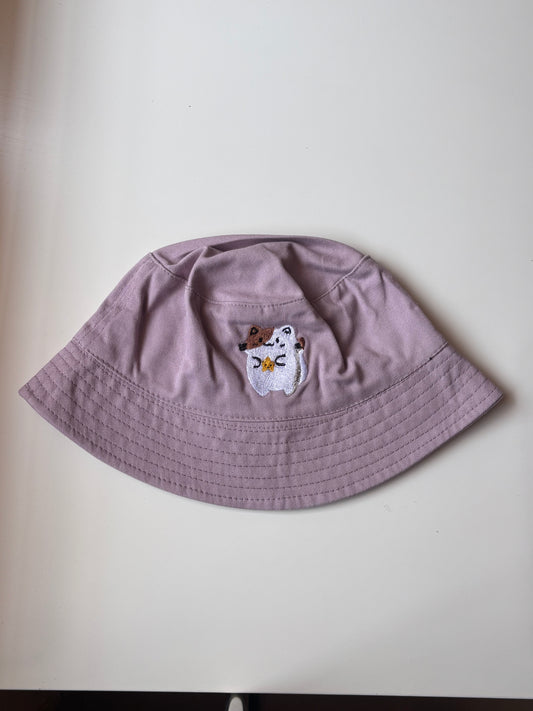 Cate holding star bucket hat