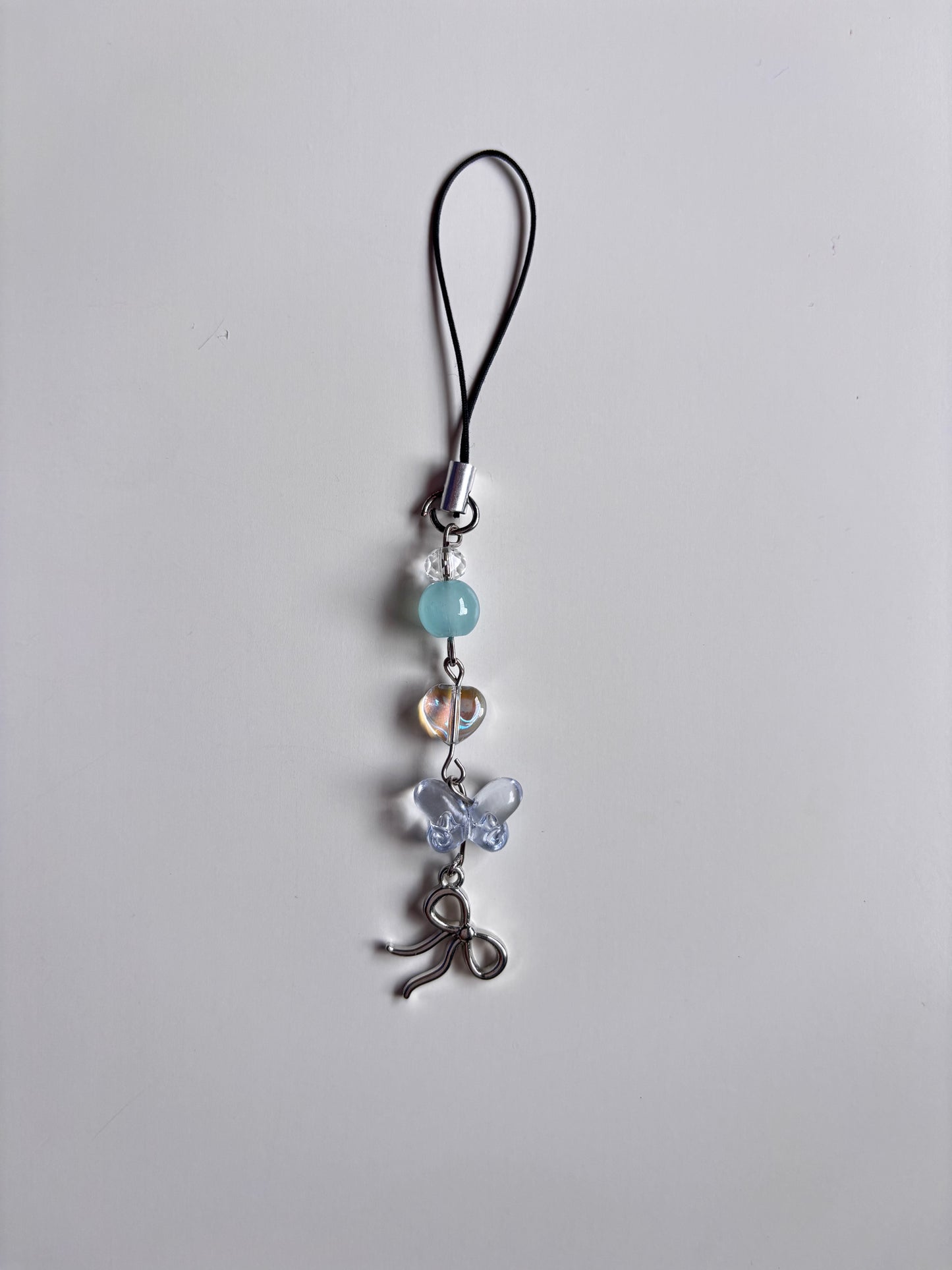 Bow magic beaded charm