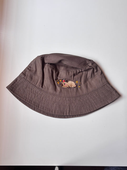 Sleepy capybara bucket hat